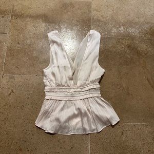 Storia cropped peplum tank top with deep v.